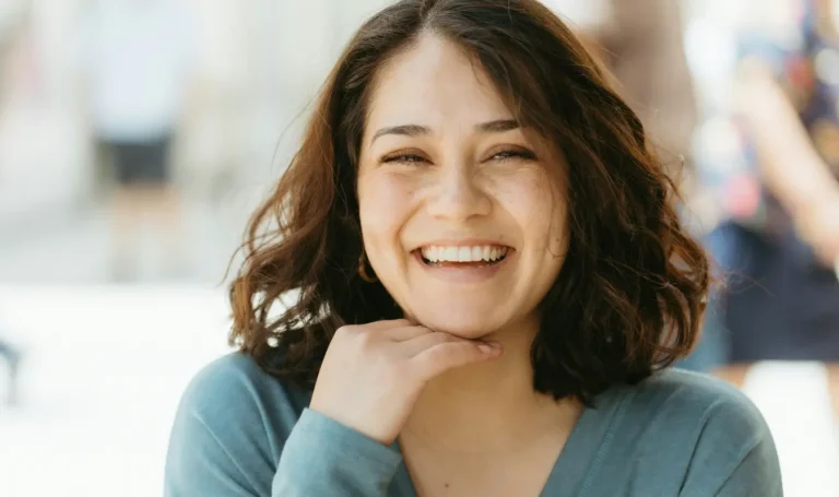 A close-up, clean lifestyle photo of healthy, full hair on a woman or man in an outdoor Montana setting. Warm, natural light. Not clinical looking.